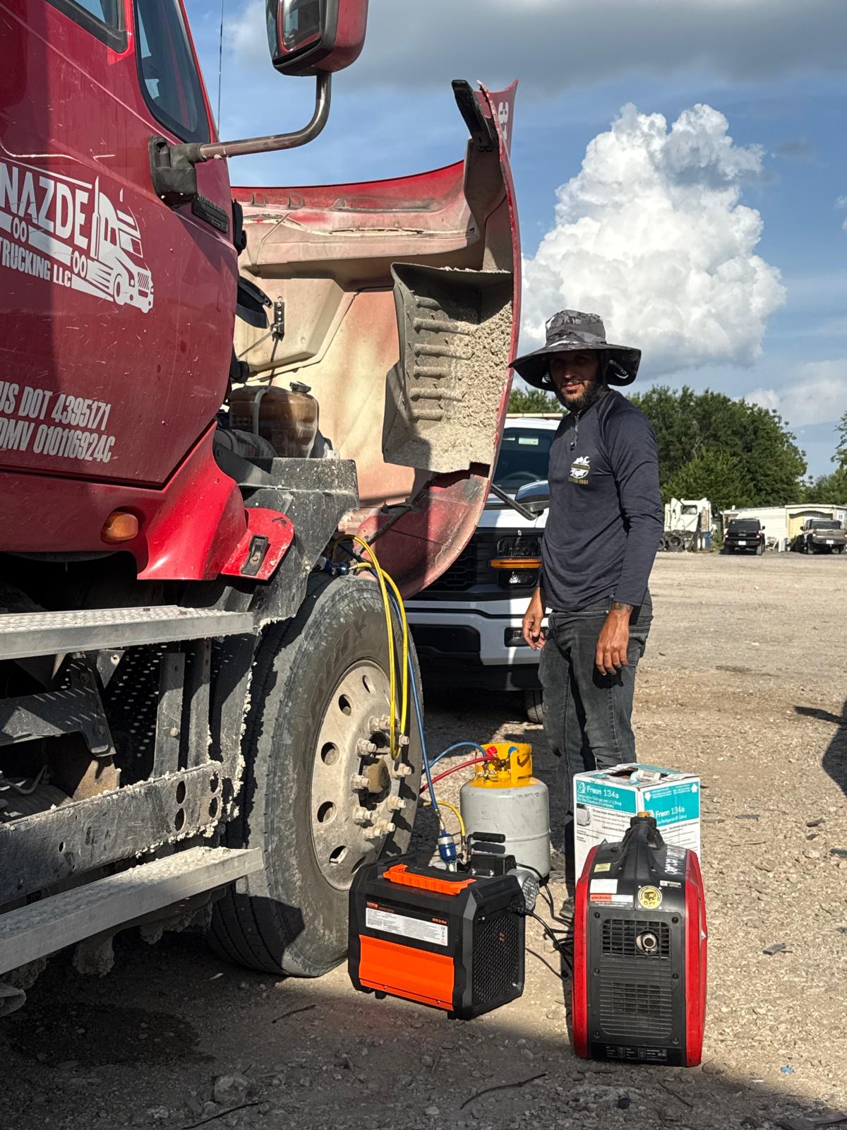 Truck mechanic inspecting commercial vehicle Austin TX