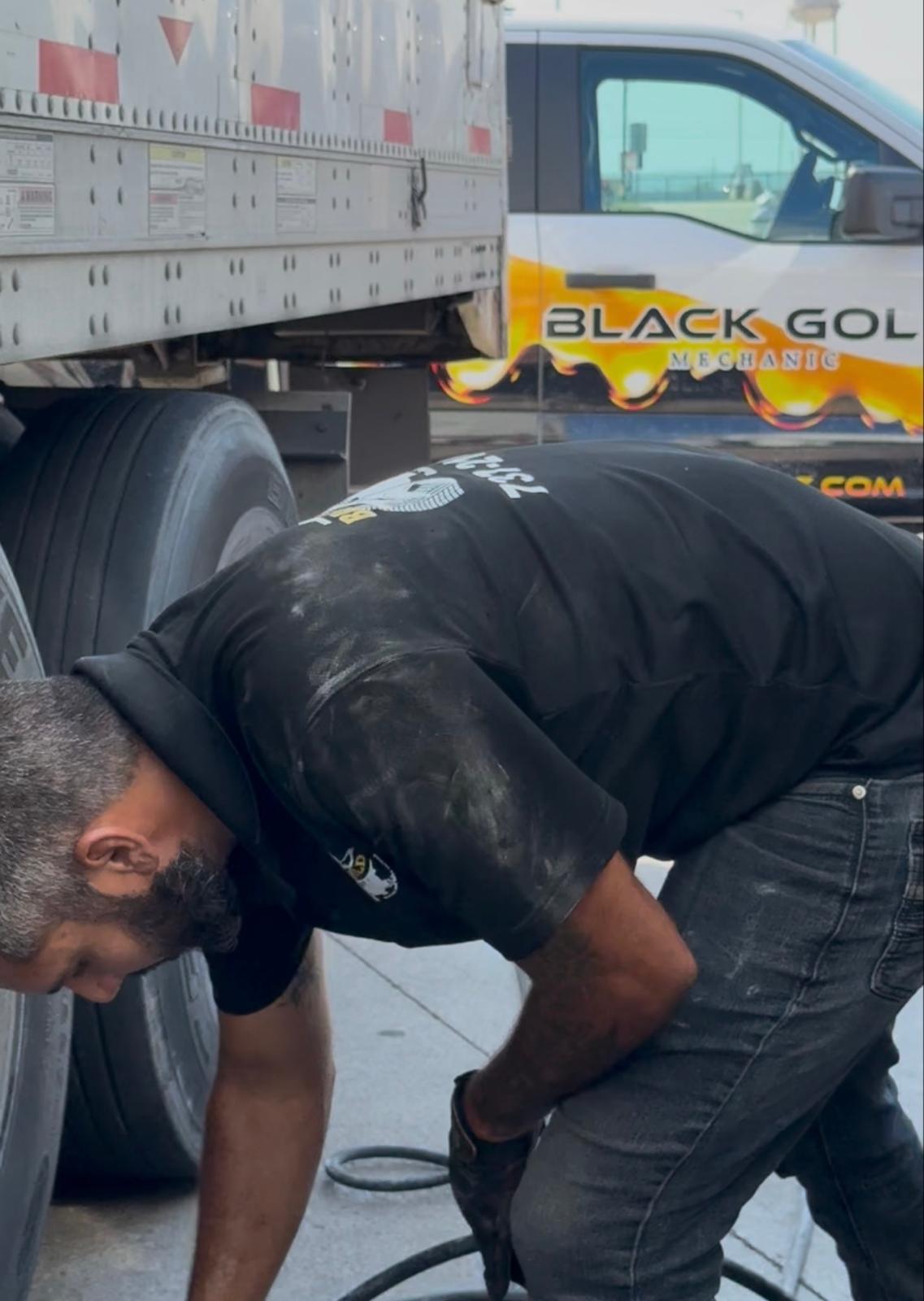 Truck mechanic inspecting commercial vehicle Austin TX
