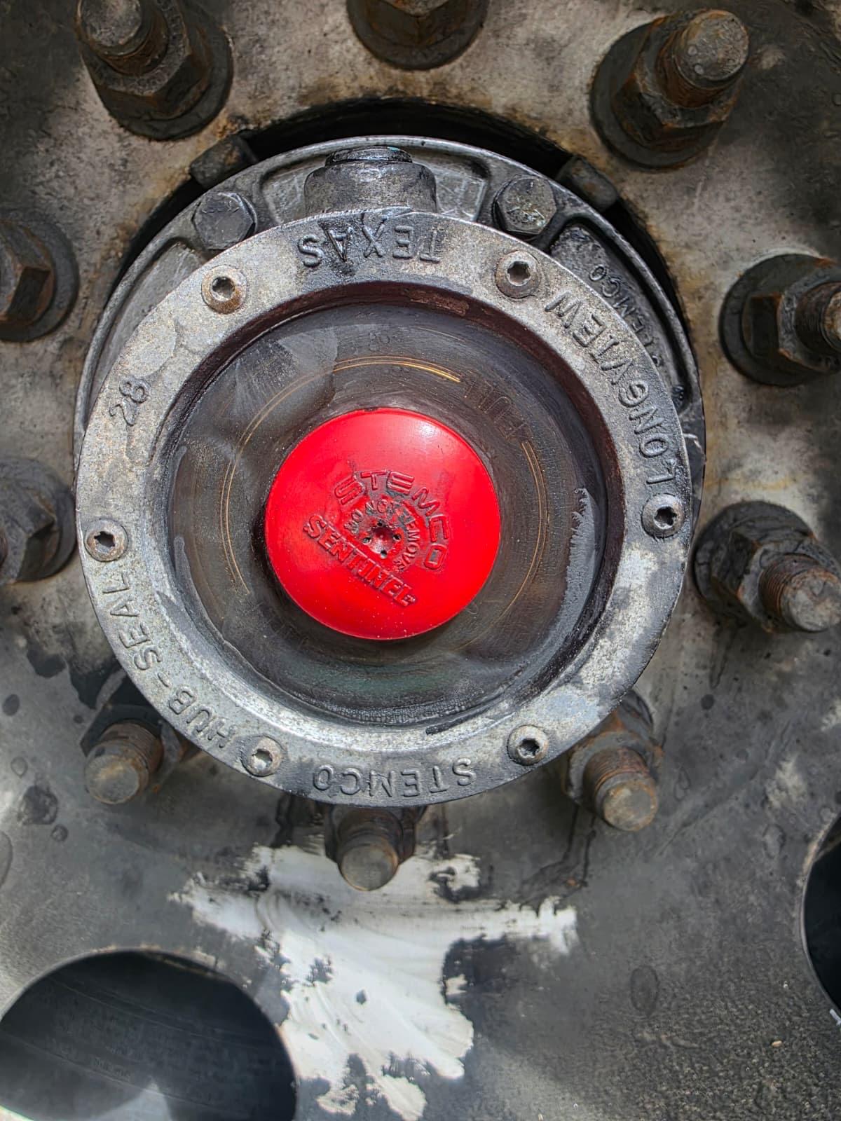 Truck mechanic inspecting commercial vehicle Austin TX